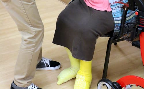 Elderly patient's bandaged feet